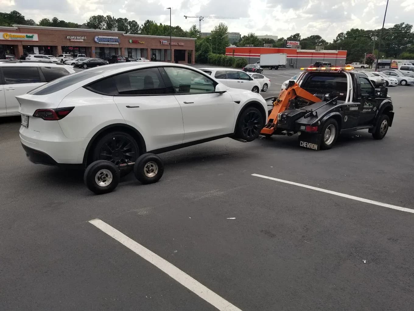 Tesla Model Y removed from a parking lot